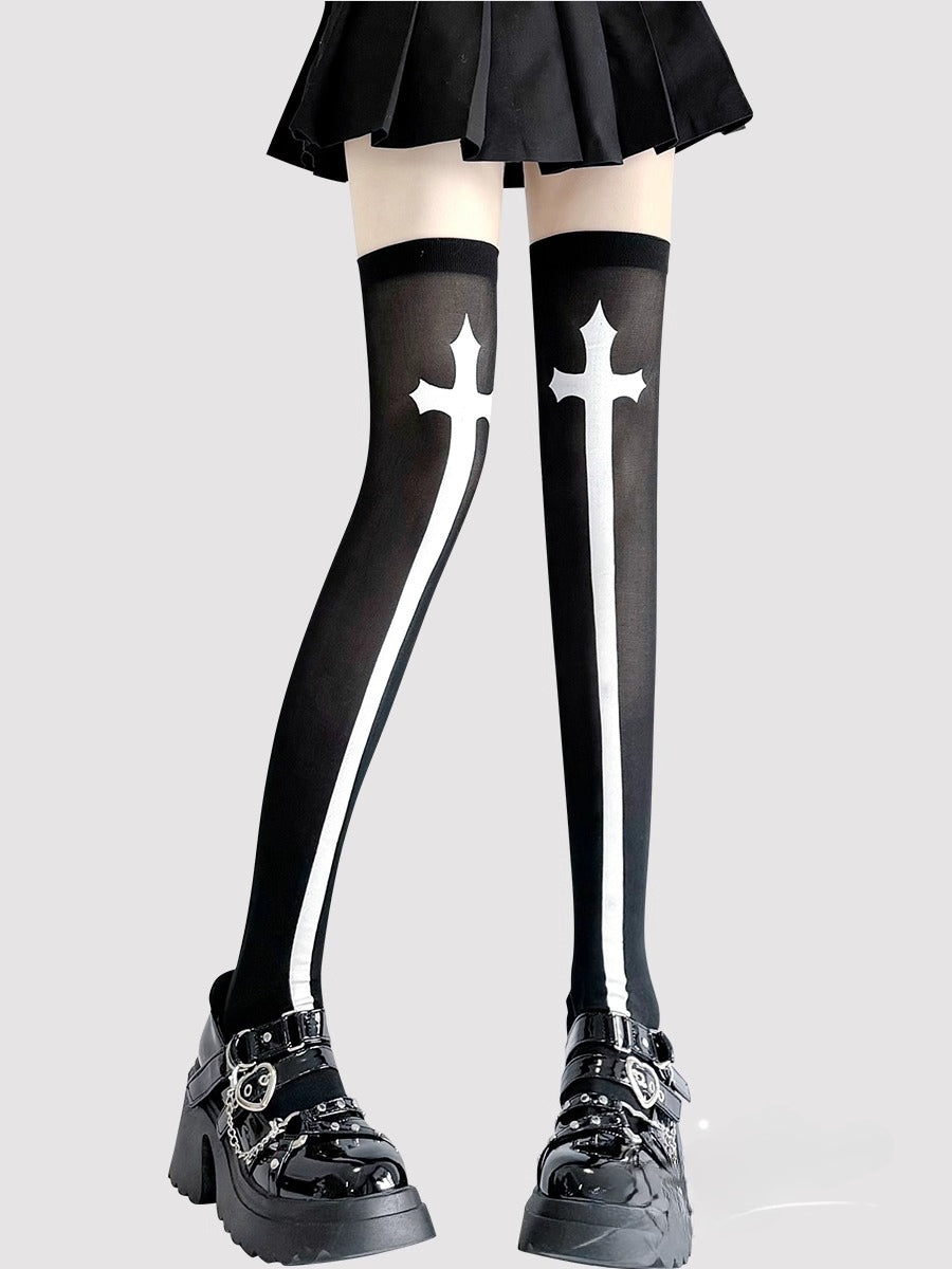 Inspired by the rebellious fusion of gothic punk and JK fashion, these thigh-high socks blend dark elegance with subcultural edge. The stark black-and-white contrast and symbolic cross motifs evoke a provocative yet sophisticated vibe. Perfect for Halloween events, cosplay, or streetwear statements, they embody a fearless expression of alternative style with a touch of daring allure.