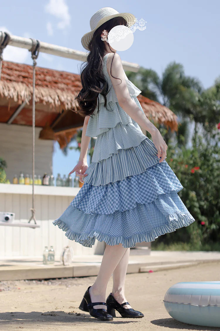 This Blue Plaid Sweet Classic Lolita JSK Dress brings a festive and charming touch to holiday styling. Designed with multi-layered ruffles and delicate print details, it creates a voluminous silhouette full of elegance and playfulness. The timeless plaid pattern adds a classic feel, while the soft blue hue enhances its gentle sweetness. Perfect for tea parties, gatherings, or seasonal events, this dress embodies the essence of Lolita fashion with both grace and cuteness.