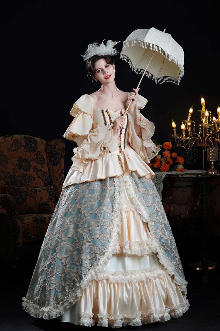 Adorn yourself in timeless elegance with this exquisite Victorian-style Lolita dress. Delicately crafted in soft blue or champagne hues, the gown features dramatic bell sleeves adorned with tiered lace frills and intricate embroidered details. The fitted bodice flows into a classic princess silhouette, embodying royal romance and sophistication. Perfect for formal events, tea parties, or photography, this piece captures the opulence of Victorian fashion with a delicate Lolita charm.