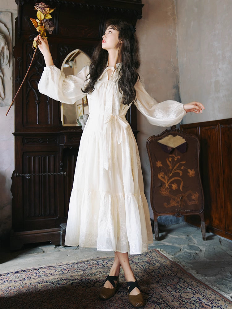 Inspired by the timeless elegance of French vintage fashion, this maxi dress features delicate floral embroidery on breathable Tencel fabric. The relaxed A-line silhouette and flowing skirt create a dreamy, feminine movement, while the adjustable waist tie allows for a customizable fit. Designed for the free-spirited woman who appreciates bohemian romance and effortless grace, this piece blends artisan craftsmanship with soft, sustainable luxury for a truly enchanting wardrobe staple.