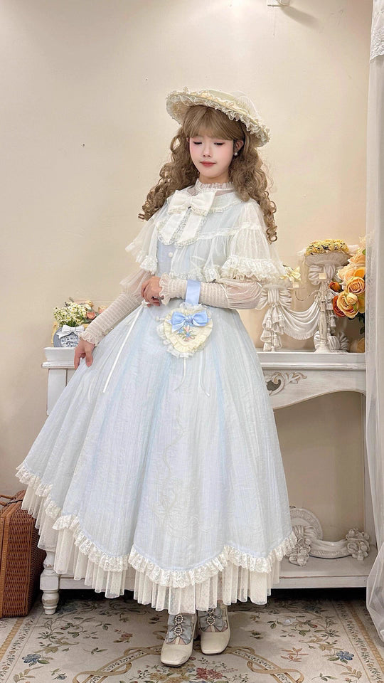 The Classic Light Blue Lolita Princess Dress is designed to highlight sweetness and refined elegance. Featuring a fitted waistline, it creates a flattering silhouette while layered details and delicate bows enhance its girlish charm. The soft light blue tone conveys purity and freshness, adding a dreamy, fairytale-like quality. Perfect for tea parties, daily wear, or special gatherings, this dress reflects the romantic and timeless essence of Japanese Lolita fashion.