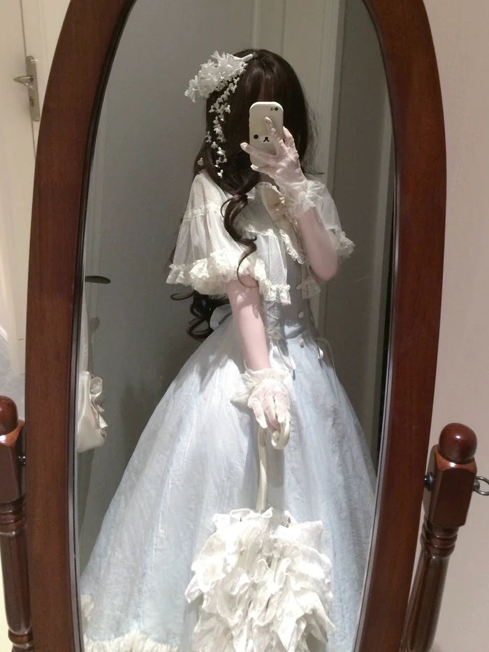 The Classic Light Blue Lolita Princess Dress is designed to highlight sweetness and refined elegance. Featuring a fitted waistline, it creates a flattering silhouette while layered details and delicate bows enhance its girlish charm. The soft light blue tone conveys purity and freshness, adding a dreamy, fairytale-like quality. Perfect for tea parties, daily wear, or special gatherings, this dress reflects the romantic and timeless essence of Japanese Lolita fashion.