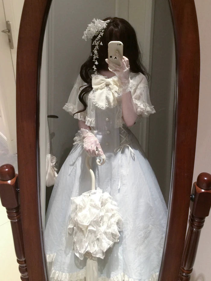 The Classic Light Blue Lolita Princess Dress is designed to highlight sweetness and refined elegance. Featuring a fitted waistline, it creates a flattering silhouette while layered details and delicate bows enhance its girlish charm. The soft light blue tone conveys purity and freshness, adding a dreamy, fairytale-like quality. Perfect for tea parties, daily wear, or special gatherings, this dress reflects the romantic and timeless essence of Japanese Lolita fashion.