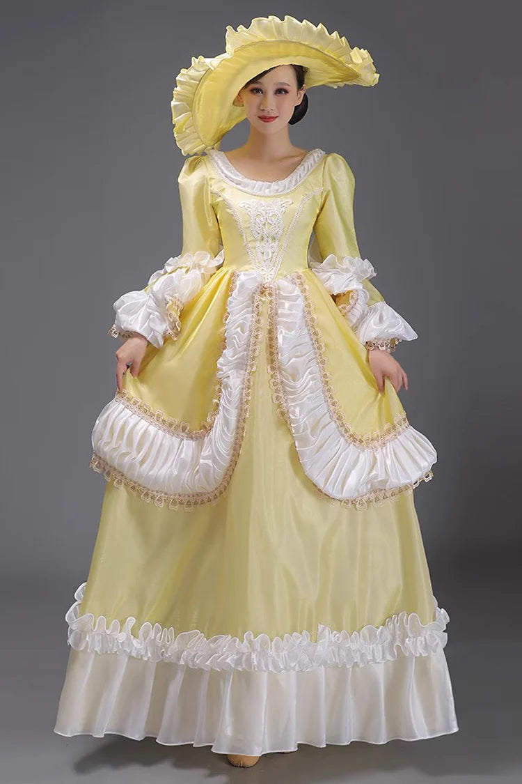 Evoking the delicate grace of a summer garden party, this dress blends timeless elegance with playful charm. The halter neckline and sleeveless design highlight feminine shoulders, while layers of lace ruffles and satin bows cascade like blooming petals. Crafted in a soft ivory-pink hue, it captures the essence of romance—inviting the wearer to step into a dream where sweetness and sophistication dance in perfect harmony.