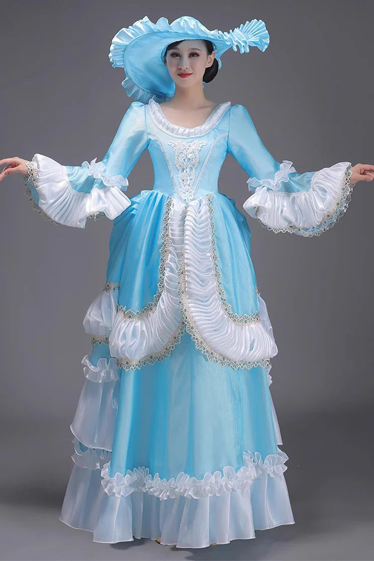 Evoking the delicate grace of a summer garden party, this dress blends timeless elegance with playful charm. The halter neckline and sleeveless design highlight feminine shoulders, while layers of lace ruffles and satin bows cascade like blooming petals. Crafted in a soft ivory-pink hue, it captures the essence of romance—inviting the wearer to step into a dream where sweetness and sophistication dance in perfect harmony.