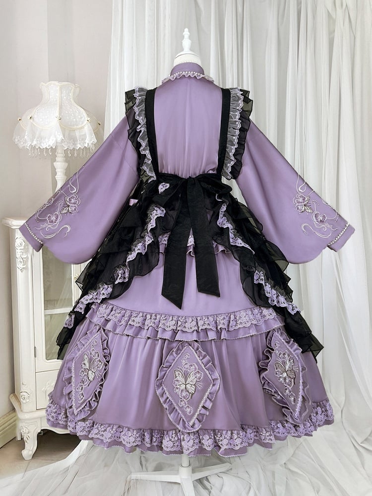 The Classic Purple Han Lolita Dress Set is designed to blend traditional elegance with Lolita sweetness. Featuring delicate butterfly and floral embroidery, it showcases refined craftsmanship and a graceful silhouette. The rich purple tone conveys nobility and charm, while the contrasting black apron adds depth and vintage flair. Perfect for cultural events, tea parties, or special gatherings, this full set reflects the harmonious fusion of Han-inspired beauty and Lolita fashion.
