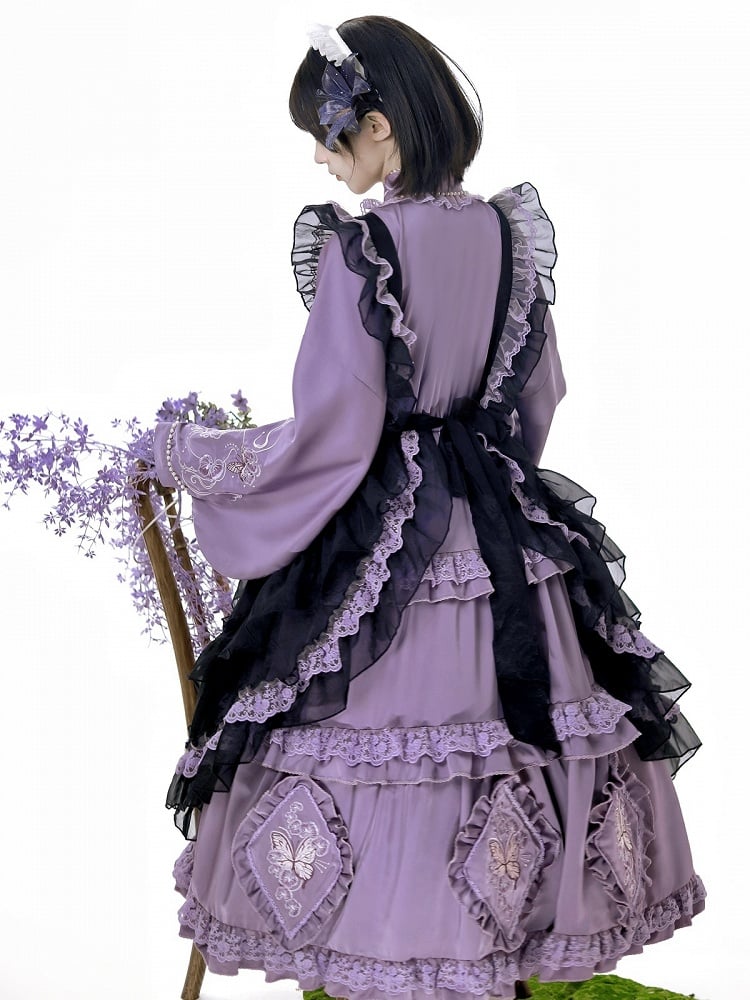The Classic Purple Han Lolita Dress Set is designed to blend traditional elegance with Lolita sweetness. Featuring delicate butterfly and floral embroidery, it showcases refined craftsmanship and a graceful silhouette. The rich purple tone conveys nobility and charm, while the contrasting black apron adds depth and vintage flair. Perfect for cultural events, tea parties, or special gatherings, this full set reflects the harmonious fusion of Han-inspired beauty and Lolita fashion.