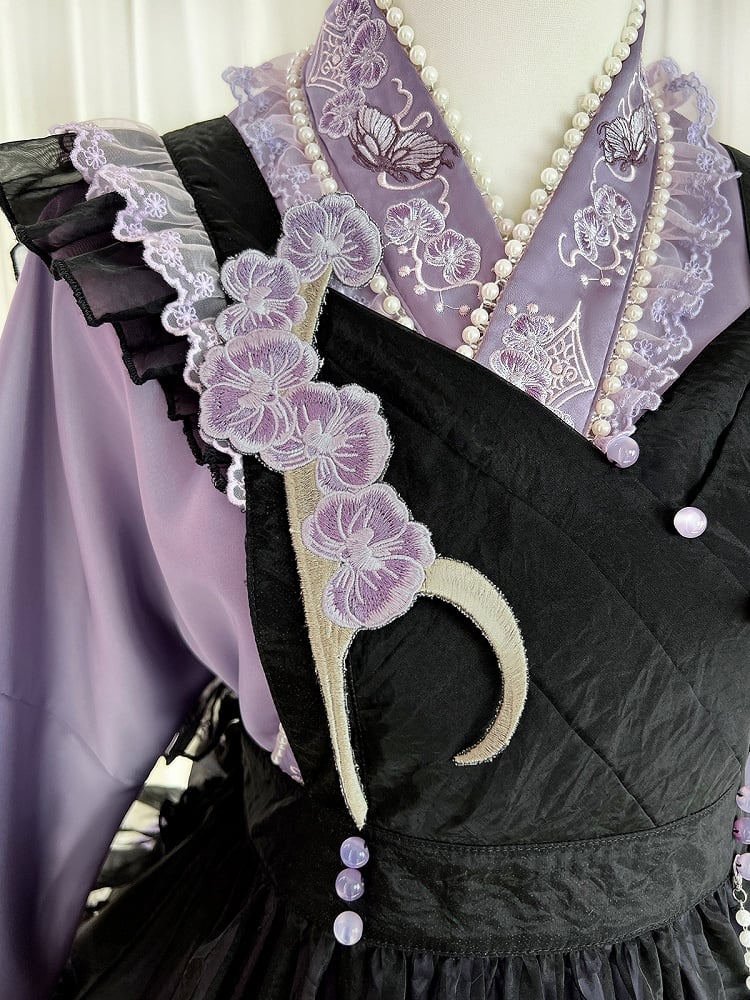 The Classic Purple Han Lolita Dress Set is designed to blend traditional elegance with Lolita sweetness. Featuring delicate butterfly and floral embroidery, it showcases refined craftsmanship and a graceful silhouette. The rich purple tone conveys nobility and charm, while the contrasting black apron adds depth and vintage flair. Perfect for cultural events, tea parties, or special gatherings, this full set reflects the harmonious fusion of Han-inspired beauty and Lolita fashion.