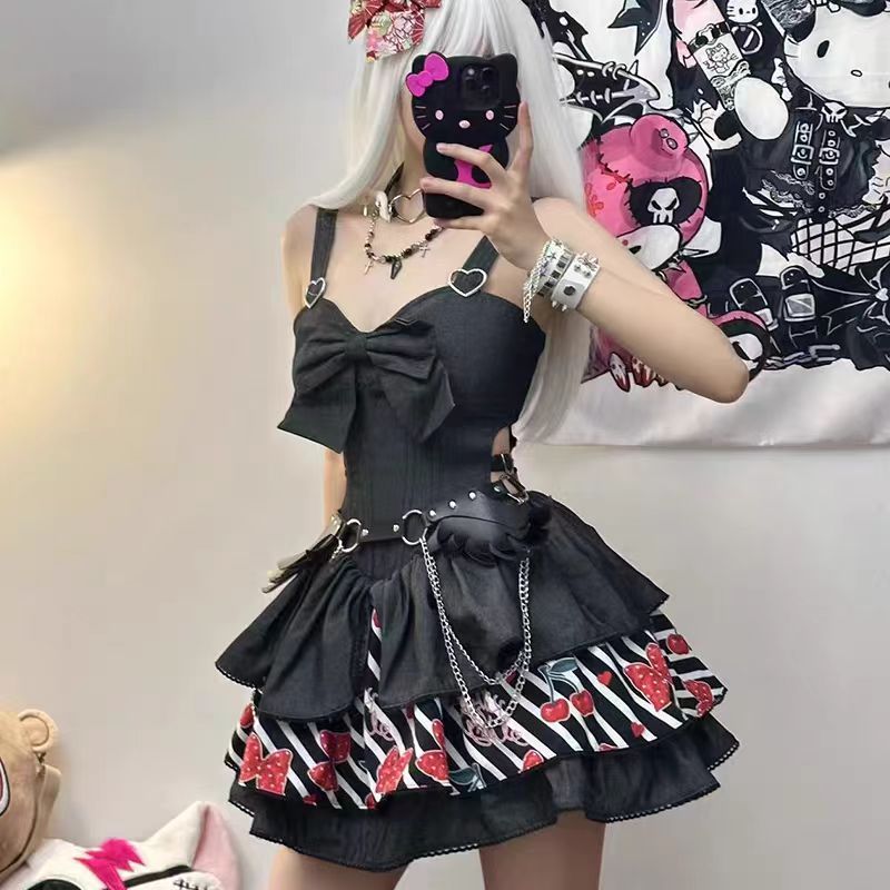 The Blue Black Denim Lolita JSK Dress blends Japanese vintage charm with sweet Lolita elegance. Designed with a sleeveless cut and triple-layer ruffles, it creates a graceful, voluminous silhouette. The denim texture adds a retro touch, while delicate prints and bowknot accents enhance its playful femininity. Perfect for daily styling, tea parties, or themed gatherings, this dress combines casual charm with timeless Lolita refinement, offering both versatility and beauty.