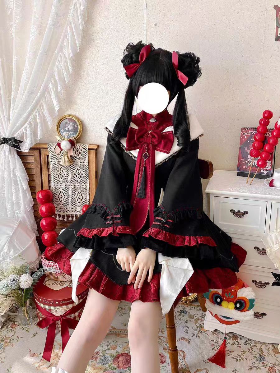 The Classic Black Red Lapel Collar Lolita Maid OP Dress captures a refined balance of elegance and playful sweetness. Its structured lapel collar, paired with charming bowknot details, highlights a delicate maid-inspired aesthetic. Long sleeves and layered ruffles enhance both comfort and volume, while the timeless black palette makes it versatile for multiple occasions. Perfect for tea parties, daily outings, or themed gatherings, this OP dress embodies classic Lolita grace with a touch of maid allure.