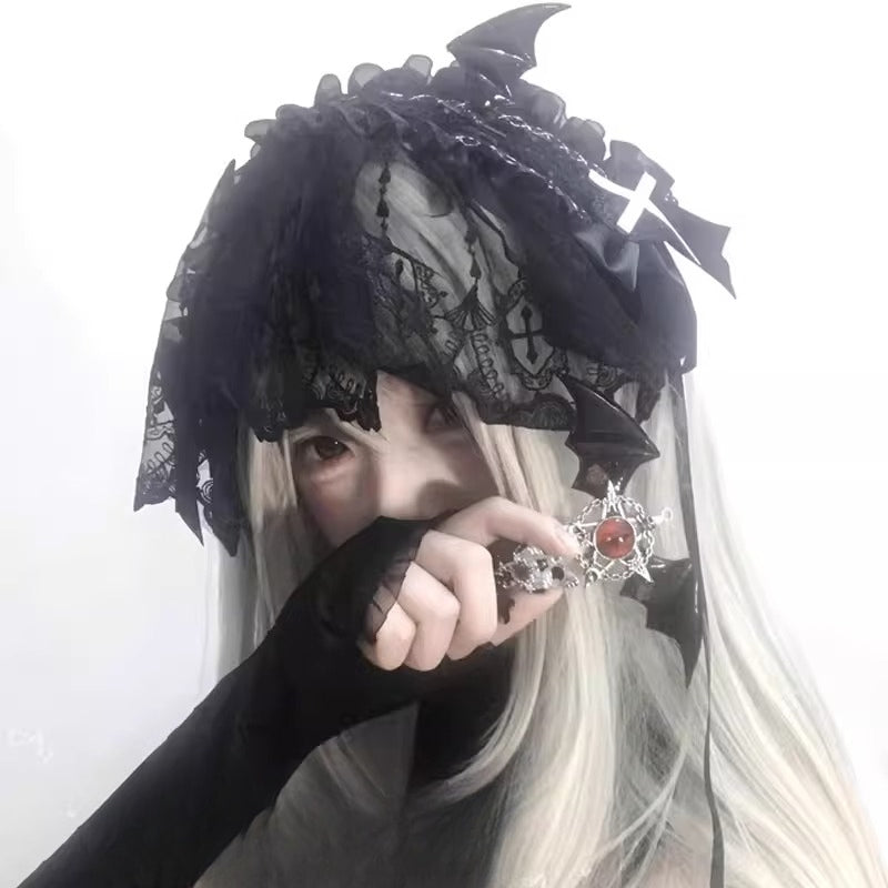This piece fuses sacred symbolism with a dark, subversive aesthetic. The design combines intricate lace, a dramatic veil, and subtle demonic accents to create a powerful statement. It empowers the wearer to explore themes of rebellion and dark romance, perfect for Gothic Lolita fashion, expressive subculture, and unforgettable Halloween personas. It’s more than an accessory; it’s a narrative.
