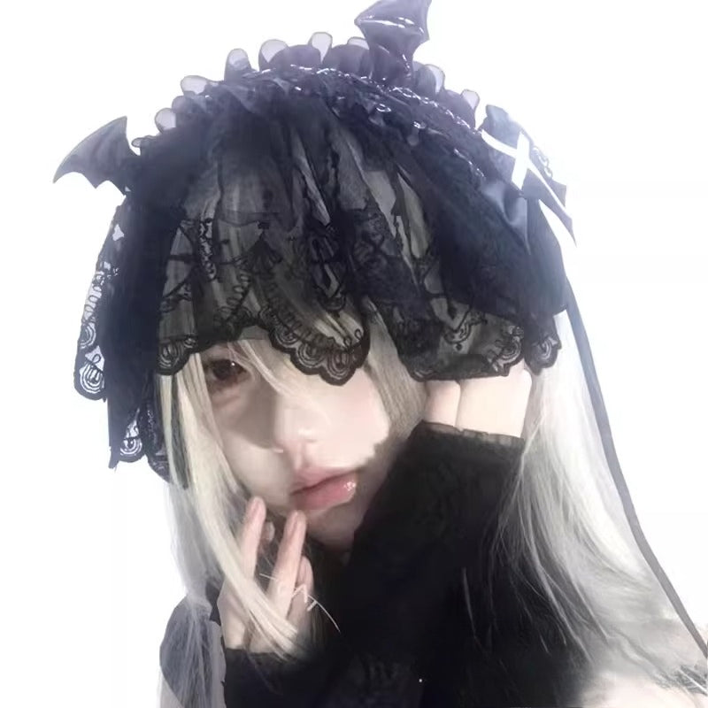This piece fuses sacred symbolism with a dark, subversive aesthetic. The design combines intricate lace, a dramatic veil, and subtle demonic accents to create a powerful statement. It empowers the wearer to explore themes of rebellion and dark romance, perfect for Gothic Lolita fashion, expressive subculture, and unforgettable Halloween personas. It’s more than an accessory; it’s a narrative.