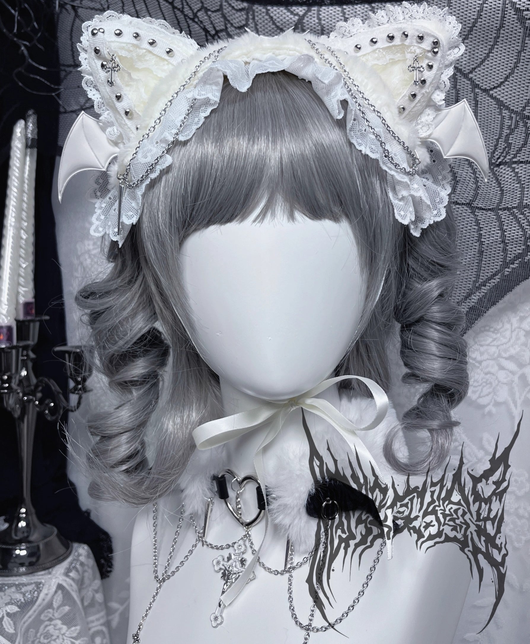 This original gothic Lolita hair clip is designed with devil cat ears and delicate lace, blending playful fantasy with dark elegance. Inspired by punk aesthetics, it combines rebellion with Lolita sweetness for a unique subculture look. Perfect for Halloween, cosplay, or alternative fashion styling, this accessory adds a bold statement to any gothic or Lolita outfit.