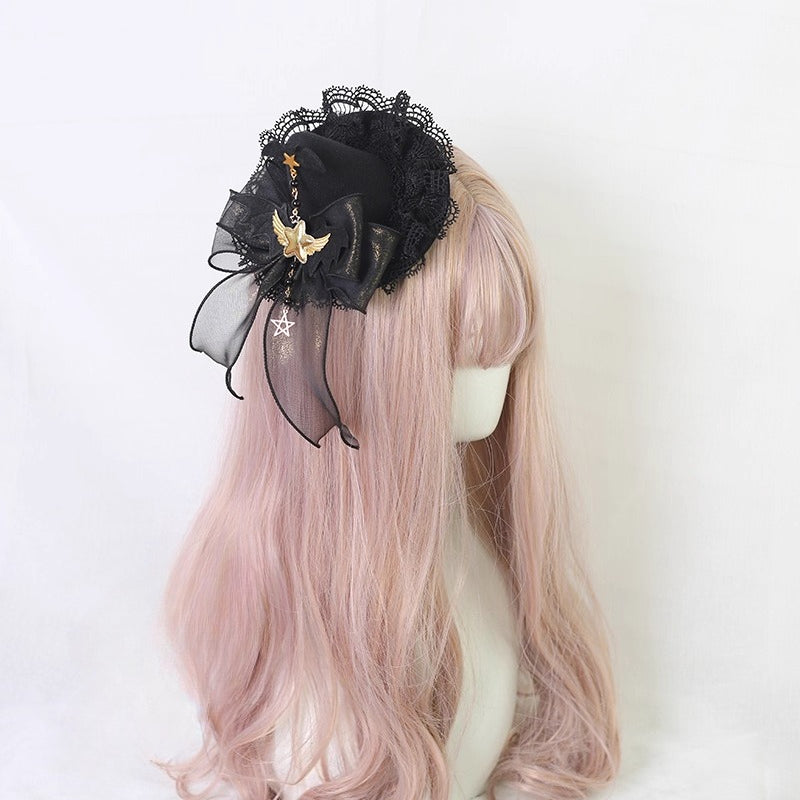 This gothic Lolita witch hat headband is crafted for a playful yet mysterious Halloween style. Designed with bat and demon elements, it combines dark fantasy with Lolita elegance. The mini top hat detail adds vintage charm, while the versatile clip design makes it easy to wear. Perfect for cosplay, themed parties, or photo shoots, it completes any enchanting outfit.