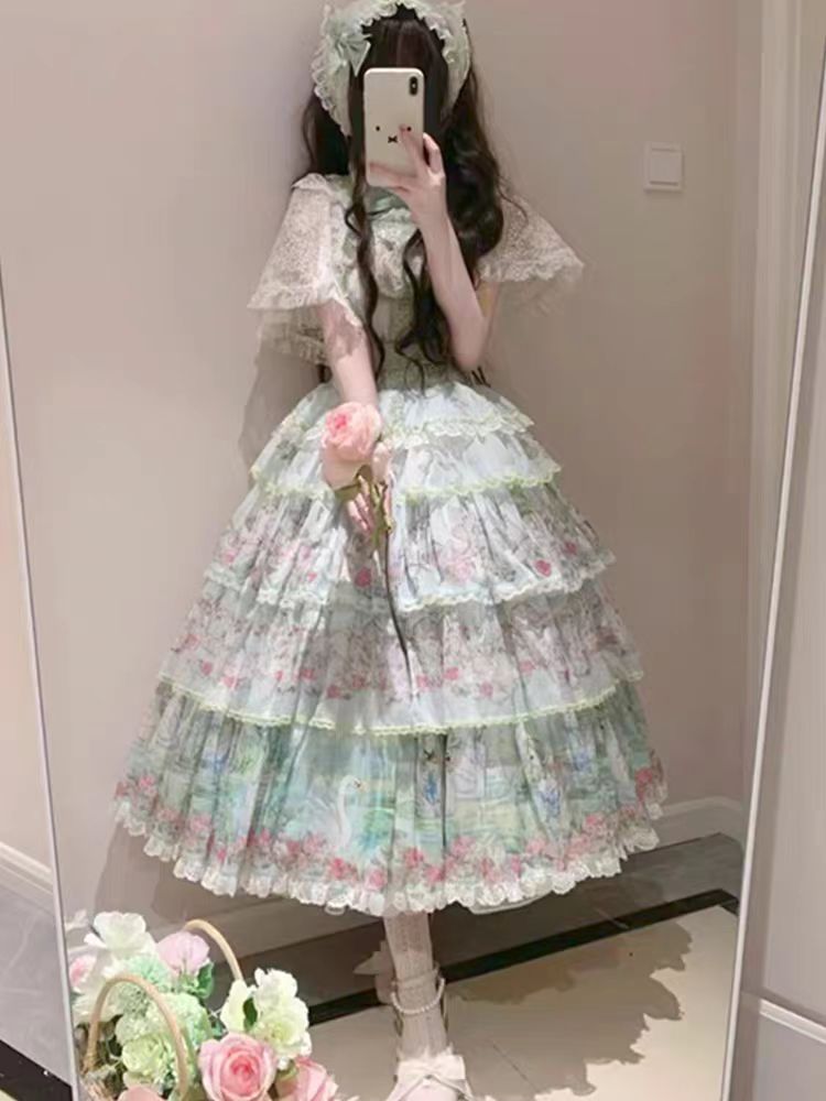 The Swan Lake Lolita JSK Dress is inspired by the elegance of ballet and the romance of fairytales. Designed with graceful lines, delicate details, and a flowing silhouette, it captures the beauty of a classic Swan Lake performance while keeping the sweet charm of Lolita fashion. Perfect for daily wear, gatherings, or special occasions, this dress blends sophistication and cuteness, making it a timeless addition to any Lolita wardrobe.