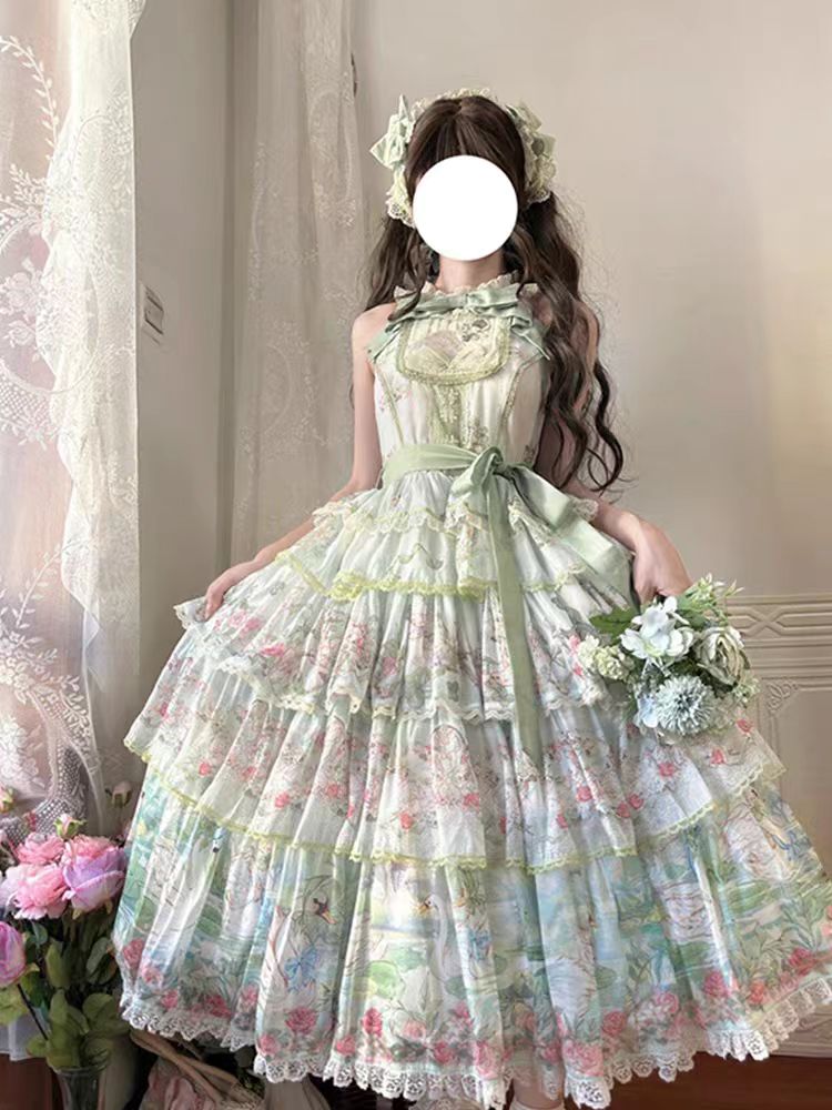 The Swan Lake Lolita JSK Dress is inspired by the elegance of ballet and the romance of fairytales. Designed with graceful lines, delicate details, and a flowing silhouette, it captures the beauty of a classic Swan Lake performance while keeping the sweet charm of Lolita fashion. Perfect for daily wear, gatherings, or special occasions, this dress blends sophistication and cuteness, making it a timeless addition to any Lolita wardrobe.
