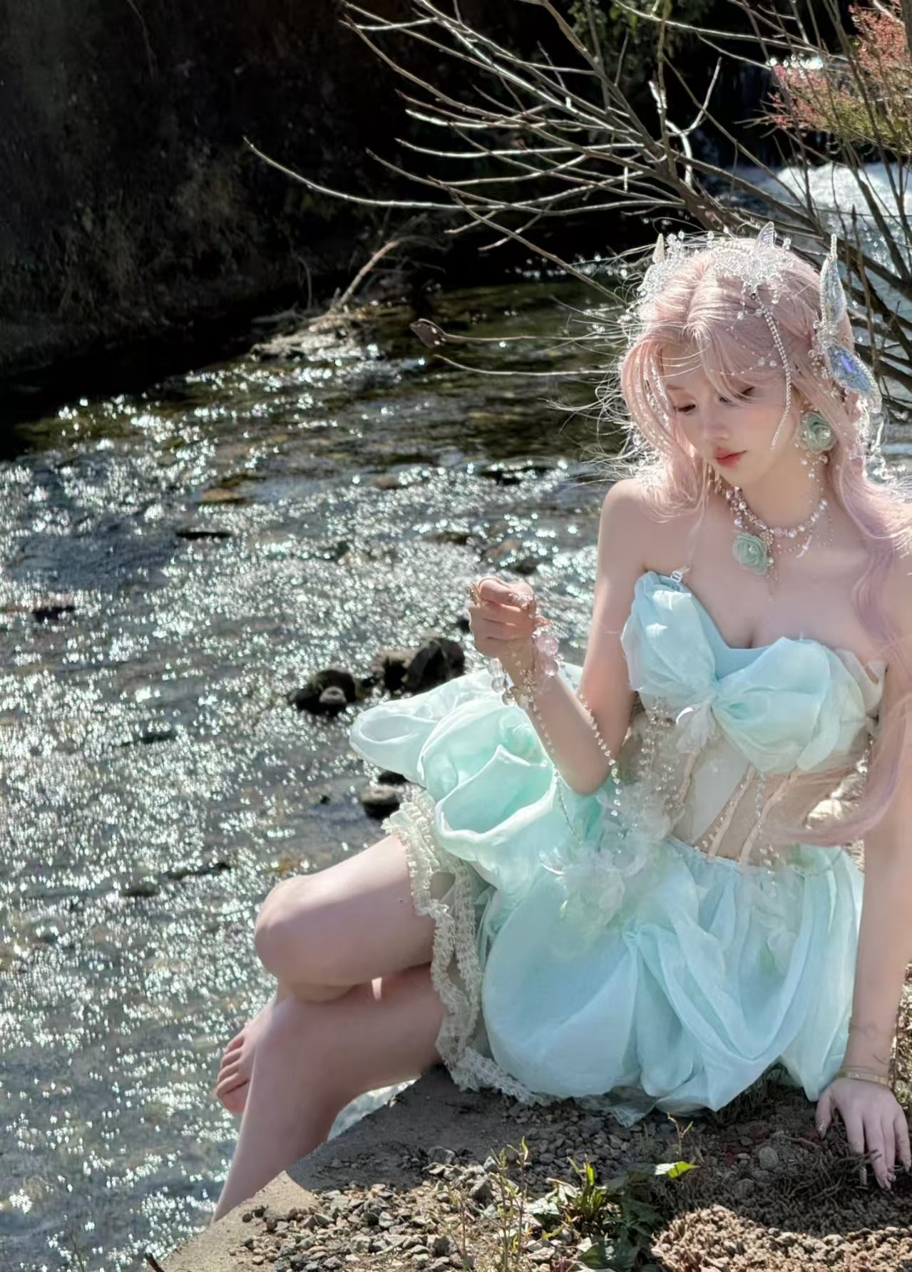 Embrace enchantment in this Green Fairy Lolita JSK. The delicate sleeveless design features a graceful fishbone corset bodice adorned with lustrous pearls and a elegant satin bowknot at the bust. Crafted with a sweet princess silhouette, this dreamy dress combines whimsical charm with timeless elegance. Perfect for creating a magical and romantic Lolita fashion statement.