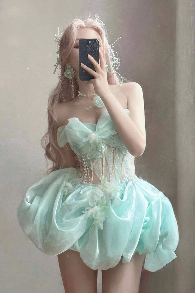 Embrace enchantment in this Green Fairy Lolita JSK. The delicate sleeveless design features a graceful fishbone corset bodice adorned with lustrous pearls and a elegant satin bowknot at the bust. Crafted with a sweet princess silhouette, this dreamy dress combines whimsical charm with timeless elegance. Perfect for creating a magical and romantic Lolita fashion statement.