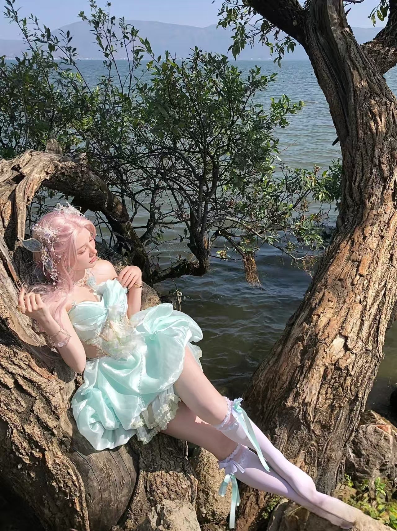 Embrace enchantment in this Green Fairy Lolita JSK. The delicate sleeveless design features a graceful fishbone corset bodice adorned with lustrous pearls and a elegant satin bowknot at the bust. Crafted with a sweet princess silhouette, this dreamy dress combines whimsical charm with timeless elegance. Perfect for creating a magical and romantic Lolita fashion statement.