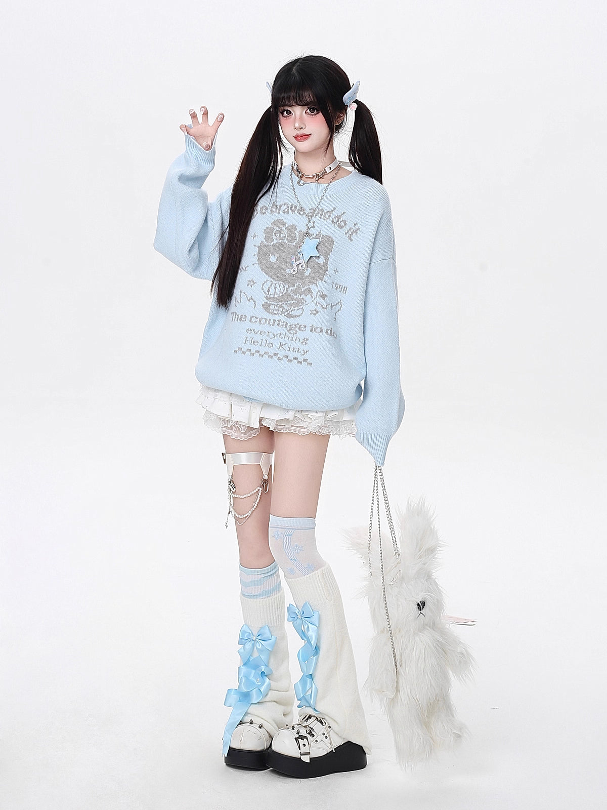 Infused with playful charm, this cozy knit features a sweet kitty print and a relaxed fit for effortless style. The soothing blue and beige palette evokes softness and youthfulness, while the lightweight fabric ensures comfort all day. Perfect for adding a touch of whimsy to your autumn wardrobe.