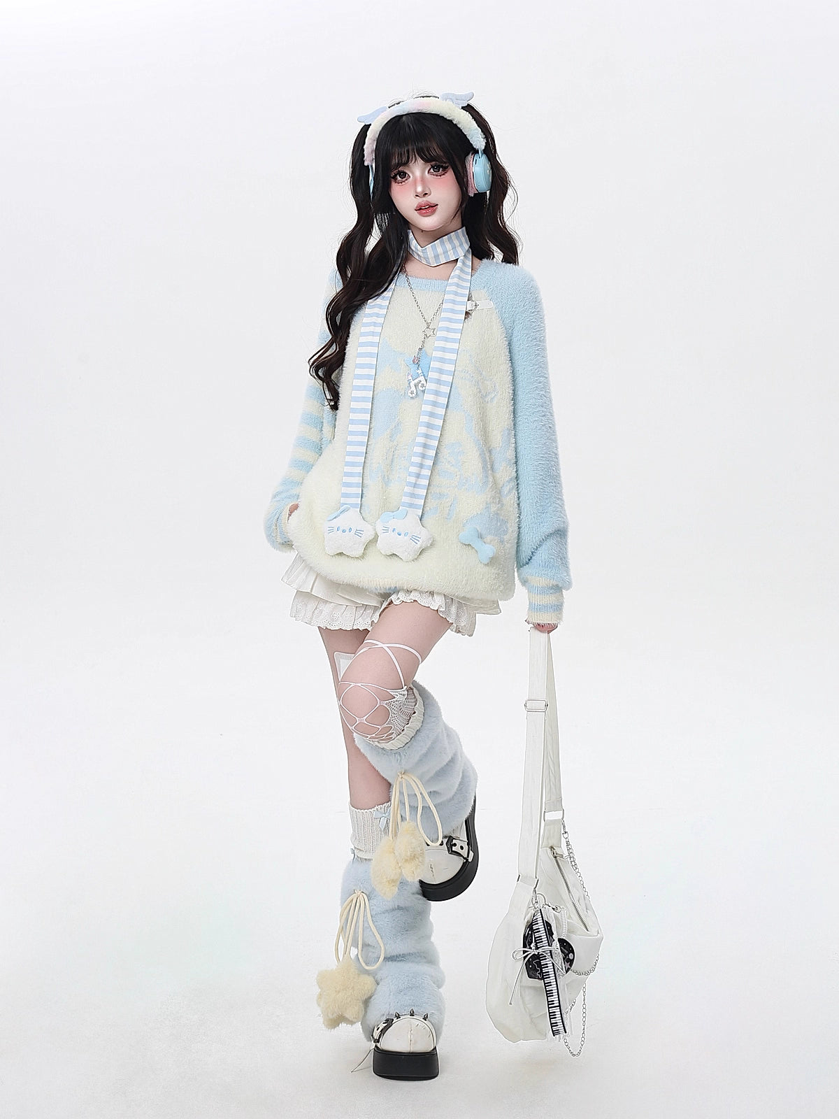 This sweater combines ultra-soft faux texture with delicate stripes for a touch of sweet elegance. The relaxed silhouette and water blue-grey palette create a dreamy, laid-back vibe, perfect for cozy days and casual outings. Lightweight yet warm, it’s an effortless blend of comfort and charm.