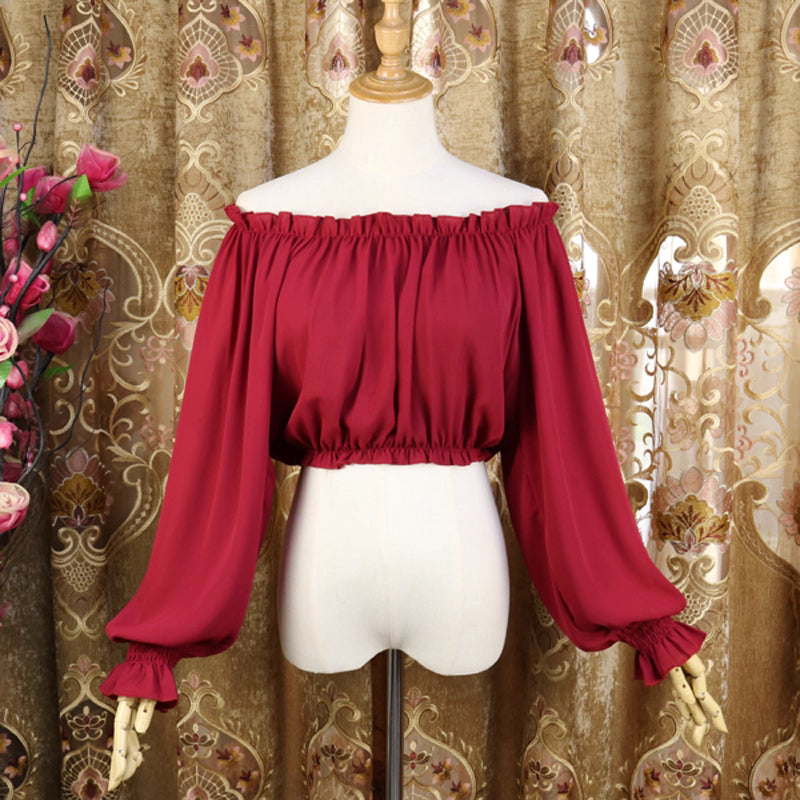 This lightweight chiffon blouse combines a classic round neck with soft puff sleeves for effortless elegance. The flowing fabric and relaxed silhouette offer versatile comfort, perfect for daily layering under jumpers or dresses. Its delicate drape and subtle sheen create a romantic foundation for both sweet and classic Lolita coordinates, blending practicality with dreamy sophistication.