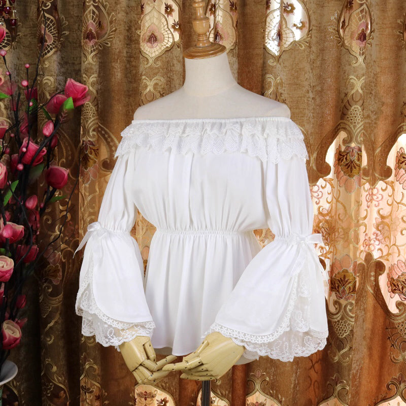 This elegant chiffon blouse features dramatic ruffled sleeves and a delicate bow accent, creating a romantic silhouette. The lightweight fabric drapes softly for effortless layering under jumpers or dresses. With its refined details and flowing texture, it blends vintage-inspired grace with modern Lolita charm, perfect for adding sophistication to any coordinate.