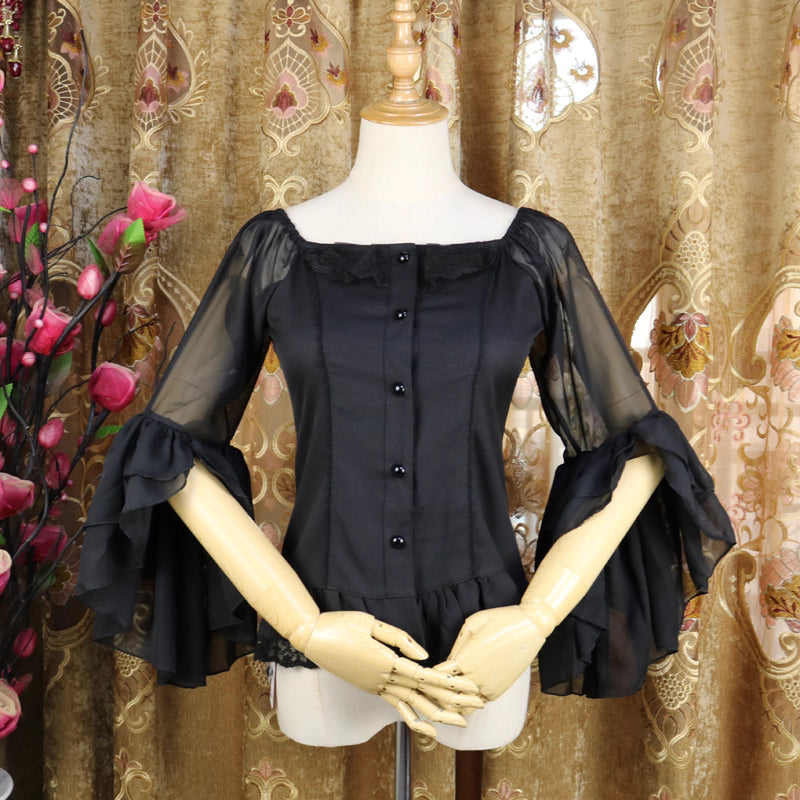 This elegant chiffon blouse combines a flattering square neckline with delicate off-shoulder styling and romantic puff sleeves. Crafted in classic black, its lightweight fabric and tailored fit create a sleek yet feminine silhouette. The three-quarter length sleeves and subtle ruffles add sophistication, making it perfect for layering under jumpers or pairing with high-waisted skirts for a timeless Lolita aesthetic.