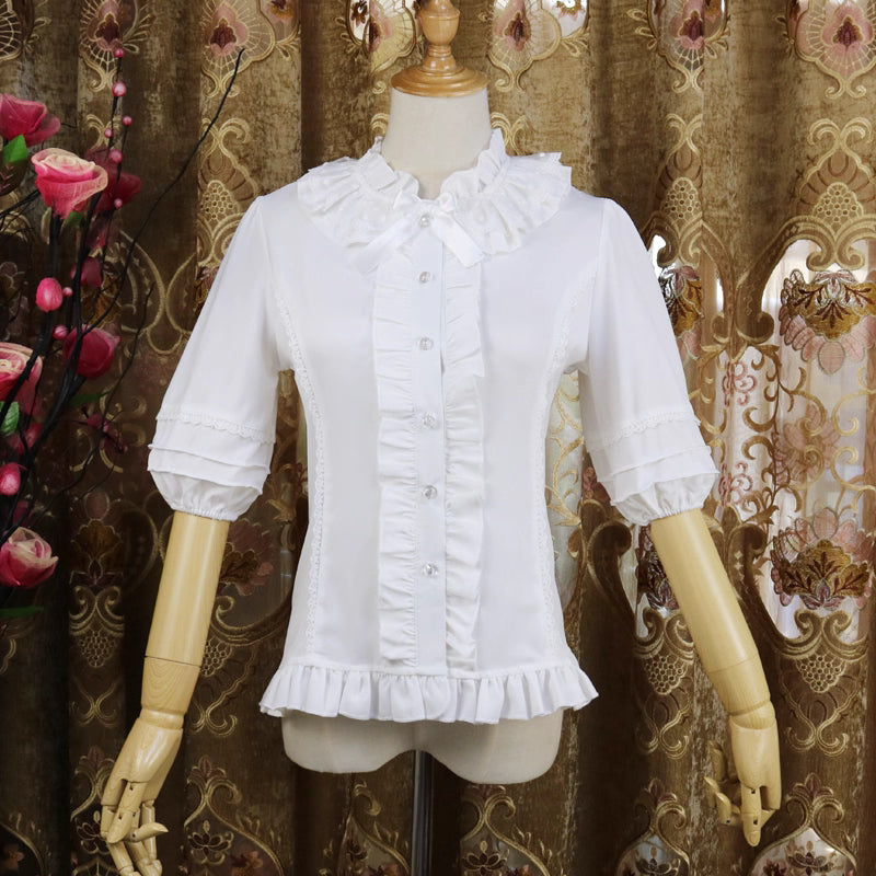 Design Concept:
This Lolita blouse features a delicate ruffle collar and elegant 5/8 sleeves, creating a refined and feminine silhouette. The slim-fit design highlights the figure while maintaining a graceful, lightweight appearance. Crafted as an inner layer, it pairs perfectly with Lolita skirts, JSK, or layered outfits. The pure white color adds a soft, classic charm suitable for a variety of styling preferences.