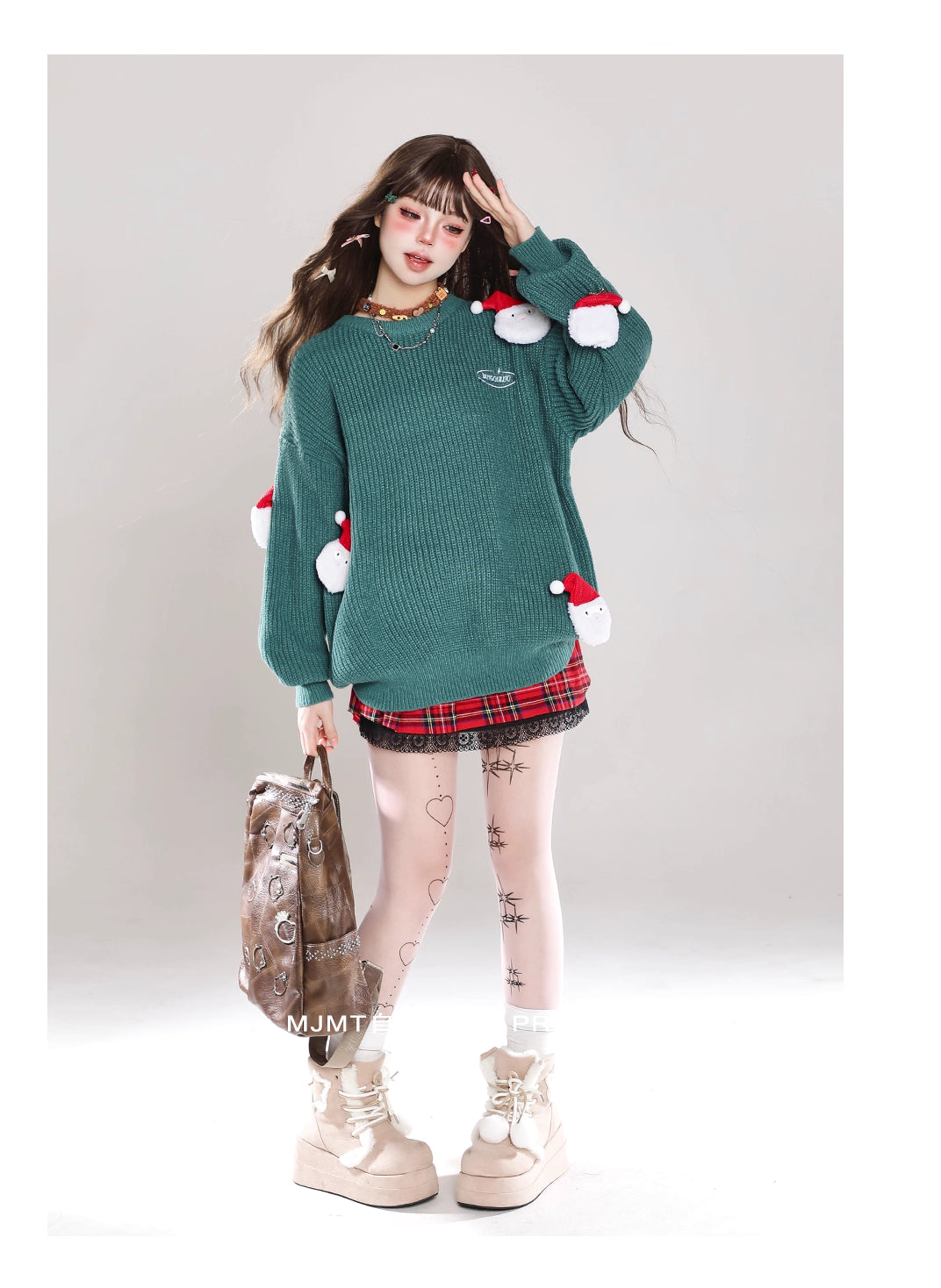 Inspired by the nostalgic charm of a classic Christmas snowman, this sweater embodies the warmth and joy of the holiday season. Crafted from premium soft knit fabric, its relaxed oversized silhouette ensures both comfort and style. The playful snowman motif, delicately embroidered, adds a touch of whimsical storytelling to the design. Perfect for cozy winter days, it blends festive elegance with everyday wearability, creating a piece that celebrates tradition while embracing modern comfort.