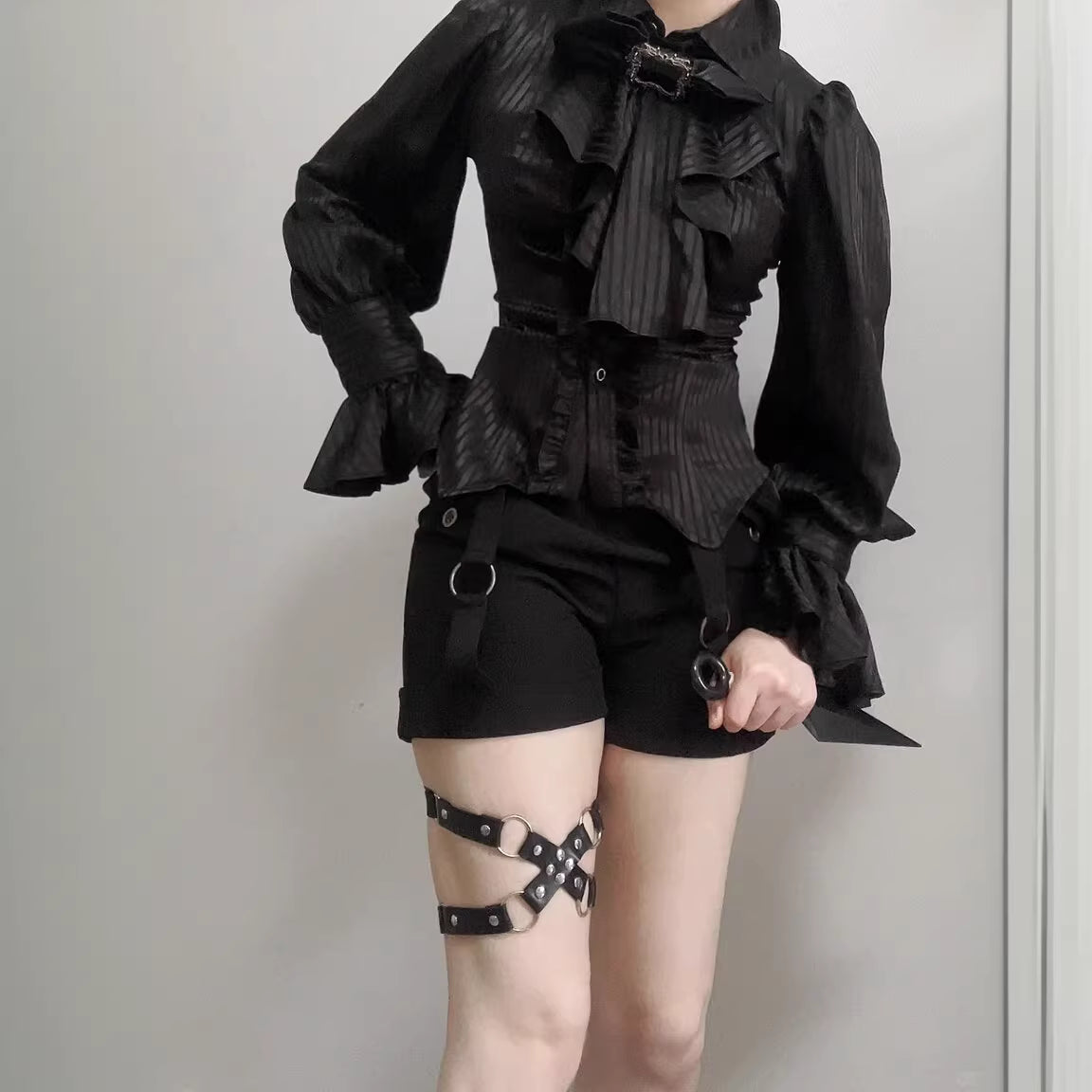 Design Concept:
This Lolita blouse in purple, white, and black blends Gothic charm with French vintage elegance. Designed with delicate tailoring and long sleeves, it creates a dramatic yet refined silhouette that is perfect for layering under Lolita dresses or wearing as a statement piece on its own. The versatile design makes it suitable for tea parties, cosplay events, and vintage-inspired gatherings, while the soft fabric ensures both comfort and style.