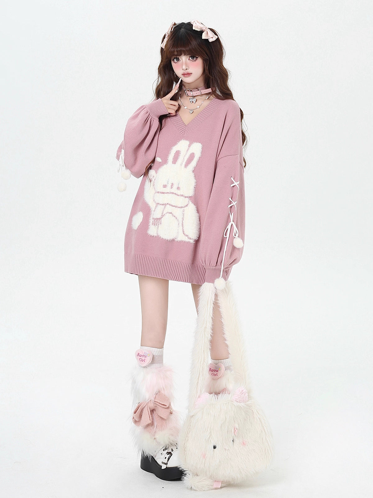 Inspired by the magic of making wishes, this dreamy sweater combines playful bunny motifs with soft romantic details. The adjustable tie-bow neckline and voluminous lantern sleeves create a whimsical silhouette, while the sweet pink and red palette evokes a sense of joyful charm. Lightweight yet cozy, it’s designed to bring a touch of fantasy to everyday wear—for those who believe in sweetness, magic, and self-expression.