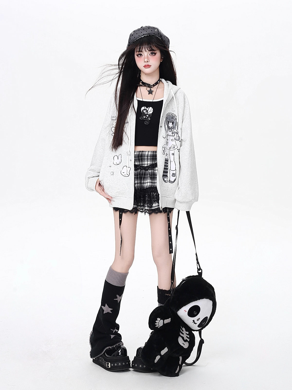 This hoodie blends playful anime-inspired graphics with a relaxed, street-ready silhouette. The high-contrast black and white design creates a bold yet cute statement, while the soft fabric and loose fit ensure all-day comfort. Ideal for expressing quirky, individual style with a touch of urban edge.