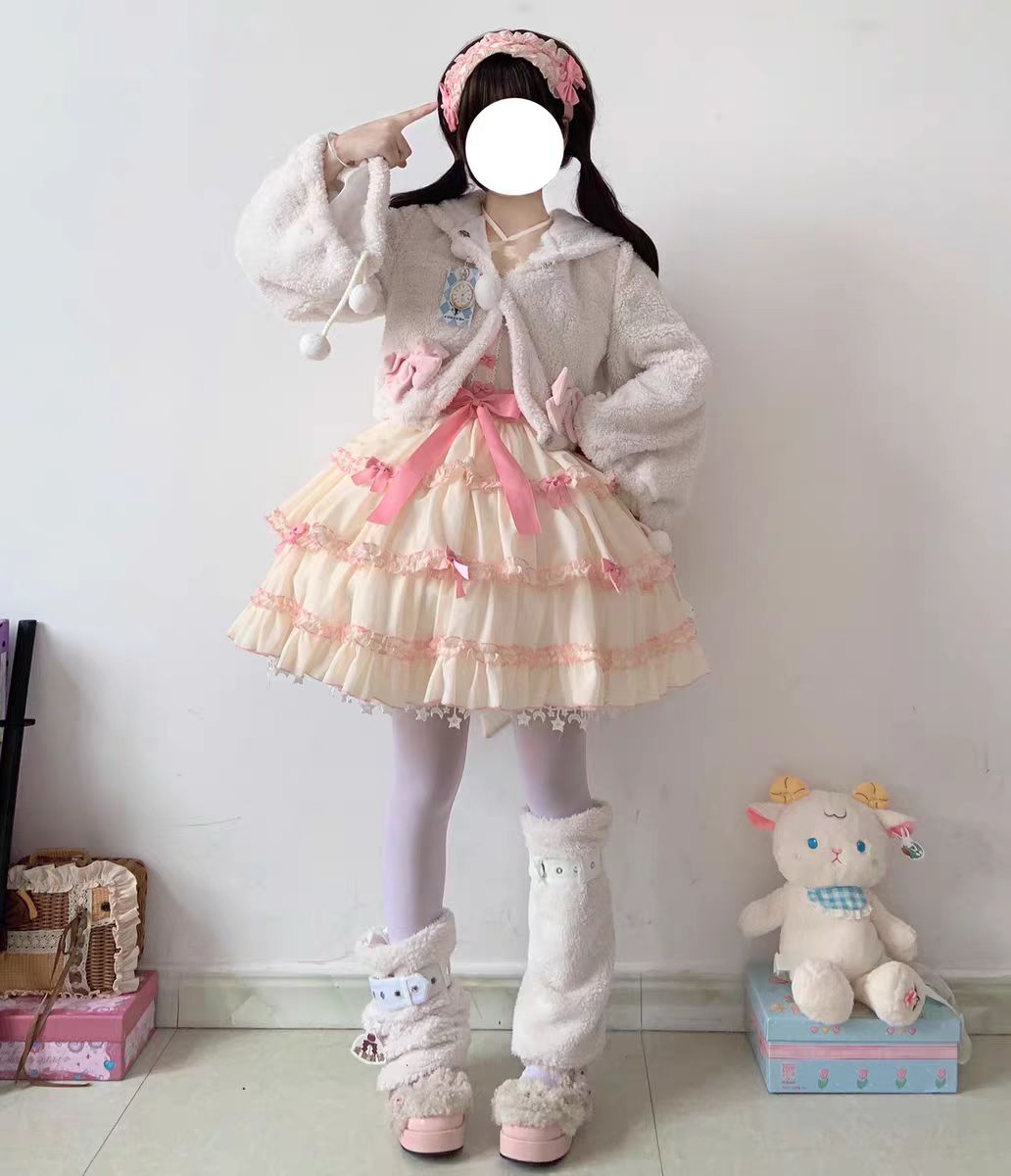 This Lolita Plush Coat in black, white, and brown tones is designed to bring both warmth and sweetness to your autumn and winter wardrobe. Made with thick plush fabric, it offers cozy comfort while maintaining a cute, doll-like charm. The short silhouette enhances a playful look, making it easy to pair with Lolita dresses or casual outfits. Perfect for daily wear, tea parties, or outdoor gatherings, this coat balances practicality with the whimsical spirit of Lolita fashion.