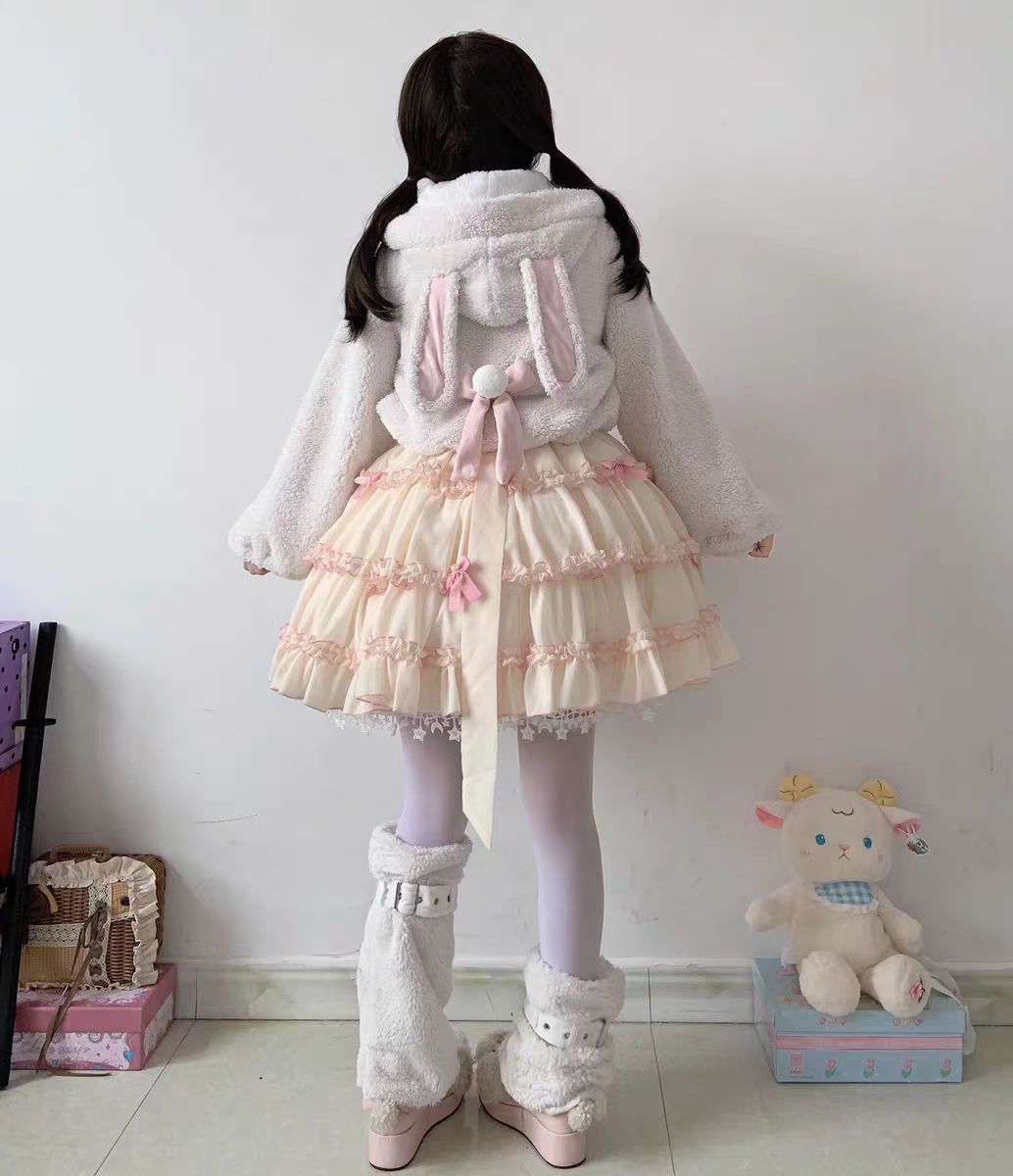 This Lolita Plush Coat in black, white, and brown tones is designed to bring both warmth and sweetness to your autumn and winter wardrobe. Made with thick plush fabric, it offers cozy comfort while maintaining a cute, doll-like charm. The short silhouette enhances a playful look, making it easy to pair with Lolita dresses or casual outfits. Perfect for daily wear, tea parties, or outdoor gatherings, this coat balances practicality with the whimsical spirit of Lolita fashion.