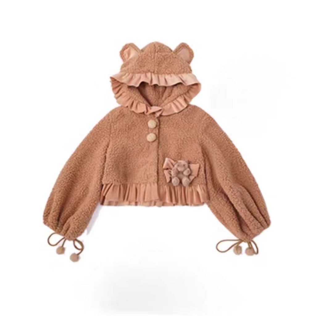 This Lolita Plush Coat in black, white, and brown tones is designed to bring both warmth and sweetness to your autumn and winter wardrobe. Made with thick plush fabric, it offers cozy comfort while maintaining a cute, doll-like charm. The short silhouette enhances a playful look, making it easy to pair with Lolita dresses or casual outfits. Perfect for daily wear, tea parties, or outdoor gatherings, this coat balances practicality with the whimsical spirit of Lolita fashion.