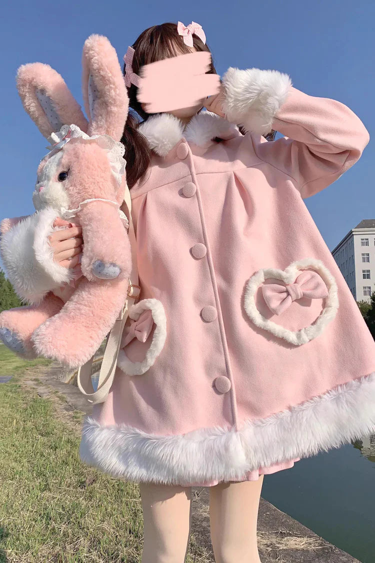 Crafted for whimsical elegance, this coat blends cozy knit fabric with dreamy Lolita aesthetics. The playful rabbit ears and delicate bow accents evoke a fairy-tale charm, while the single-row buttons and tailored silhouette ensure refined sophistication. Designed to withstand chilly days without compromising style, it empowers wearers to embrace both comfort and fantasy—turning winter into a season of enchanting self-expression.