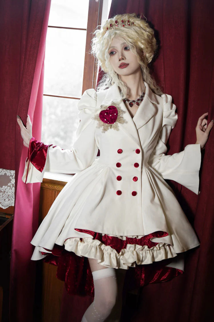 This coat defies convention with its dramatic asymmetrical hemline, blending Gothic mystery and Lolita elegance. The stark white hue and sharp double-breasted structure create a striking visual tension, while the elongated back silhouette adds a touch of theatrical romance. Designed for those who dare to stand out, it transforms the wearer into a vision of haunting beauty—where darkness and light intertwine in poetic contrast.