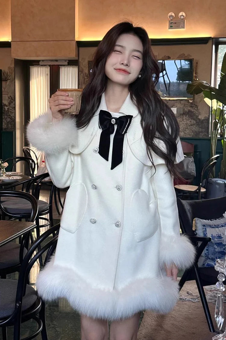 Blending whimsy with elegance, this cape coat transforms classic Lolita charm into a versatile outerwear piece. The playful rabbit ears and delicate bow contrast the monochrome palette, creating a striking balance between sweetness and sophistication. Designed with a flowing silhouette and single-row button closure, it offers effortless layering for cool days—perfect for adding a touch of fantasy to both casual and formal Lolita coordinates.