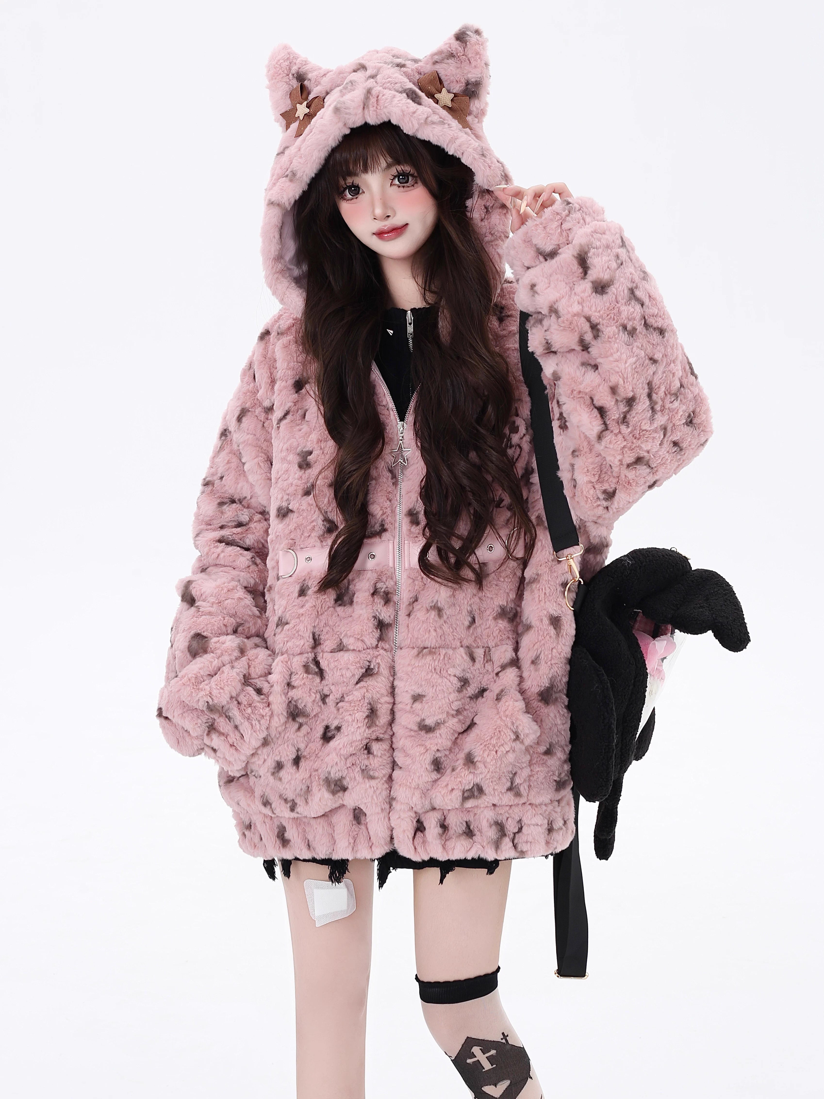 Bold and sweet collide in this original leopard-print sherpa jacket. Plush fluffy fabric meets a playful pink colorway, while the oversized cut and wild pattern express a fearless, feminine charm. Designed for those who crave warmth without sacrificing style—soft on the outside, untamed within.