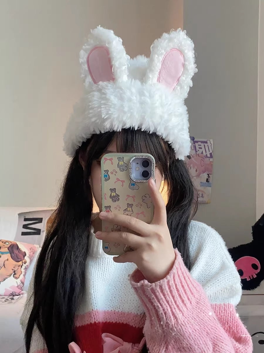 Crafted for playful charm and cozy comfort, this hat combines whimsical rabbit ears with ultra-soft plush fabric. Designed for warmth and style, its slimming silhouette and snug ear flaps provide protection against the cold while flattering every face shape. We believe in blending adorable aesthetics with practical function, turning winter essentials into a statement of joy and confidence.