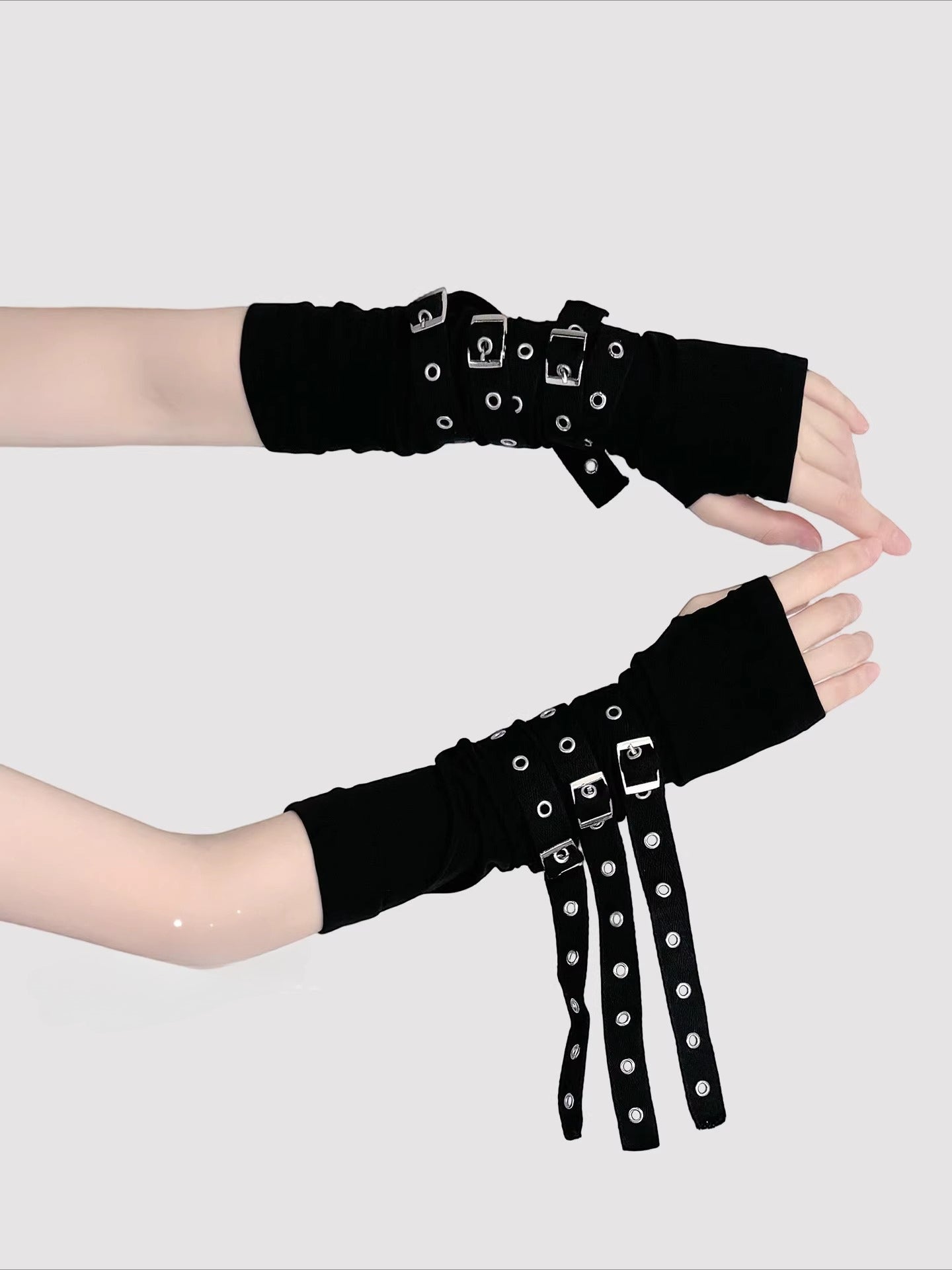 Design Concept:
Inspired by the rebellious fusion of punk and Y2K subcultures, these arm sleeves exude edgy allure. Crafted from sheer mesh with strategic strap details and bold buckle accents, they blend provocative style with lightweight comfort. Perfect for concerts, cosplay events, or streetwear statements, they add instant attitude to goth, JK, or cyberpunk outfits, celebrating dark glamour and individual expression.