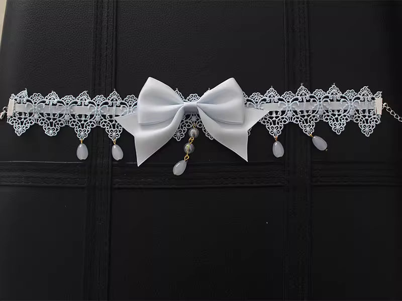 This Lolita Lace Bowknot Pearl Choker Necklace is designed as a versatile accessory to elevate any Lolita look. Featuring delicate lace, dainty pearls, and a sweet bowknot centerpiece, it strikes a balance between elegance and cuteness. The soft yet ornate design makes it perfect for pairing with dresses, from sweet styles to gothic ensembles. Ideal for tea parties, photoshoots, or daily styling, this choker adds a refined touch of Lolita charm.