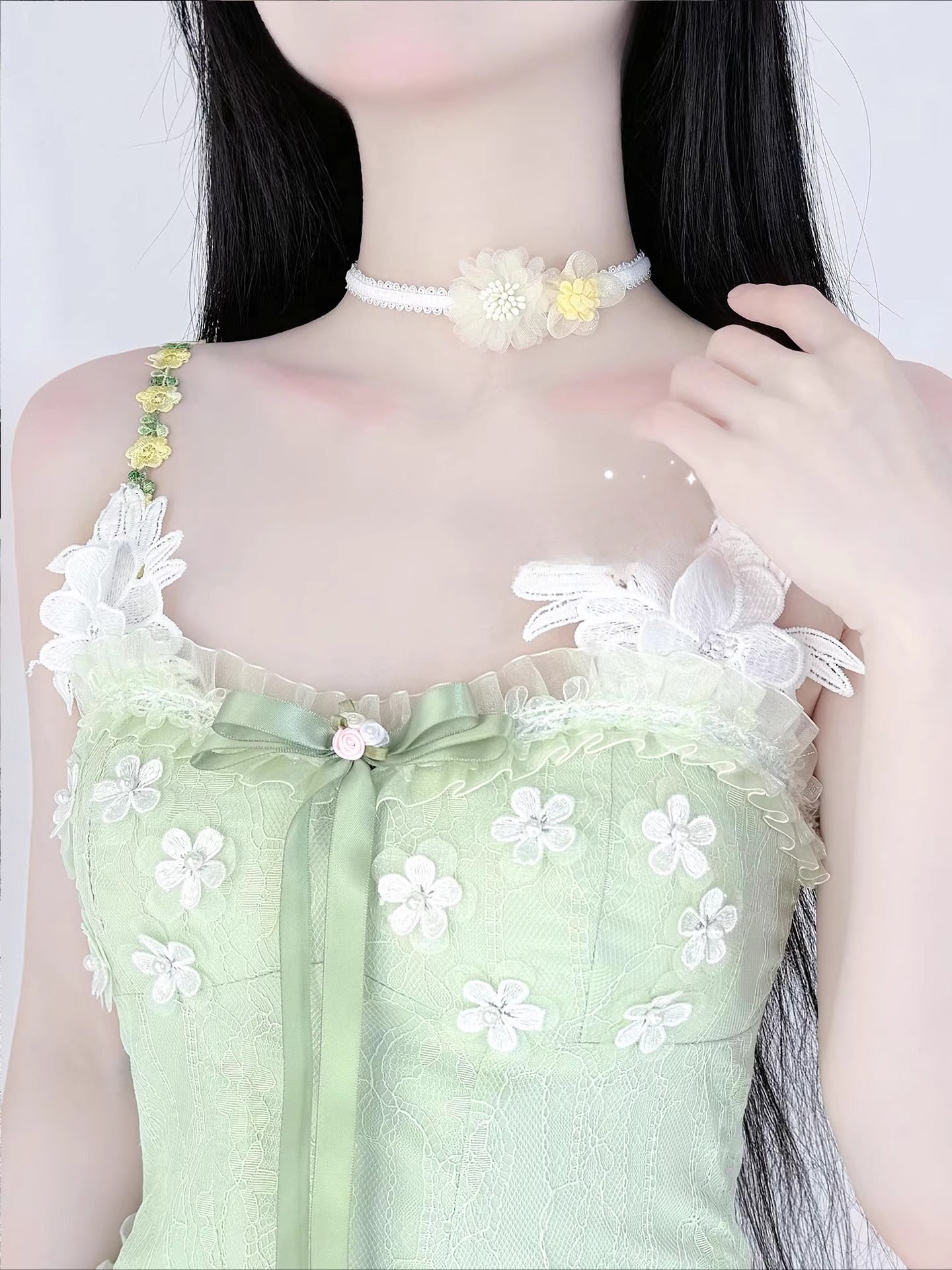 Inspired by the gentle romance of garden florals and Lolita aesthetics, this choker blooms with delicate charm. Featuring dainty pink daisies and a short, tailored fit, it rests perfectly on the collarbone for a touch of whimsical elegance. The playful yet refined design captures the essence of sweet Lolita fashion, making it an ideal accessory for adding a dreamy, feminine accent to any coordinate.