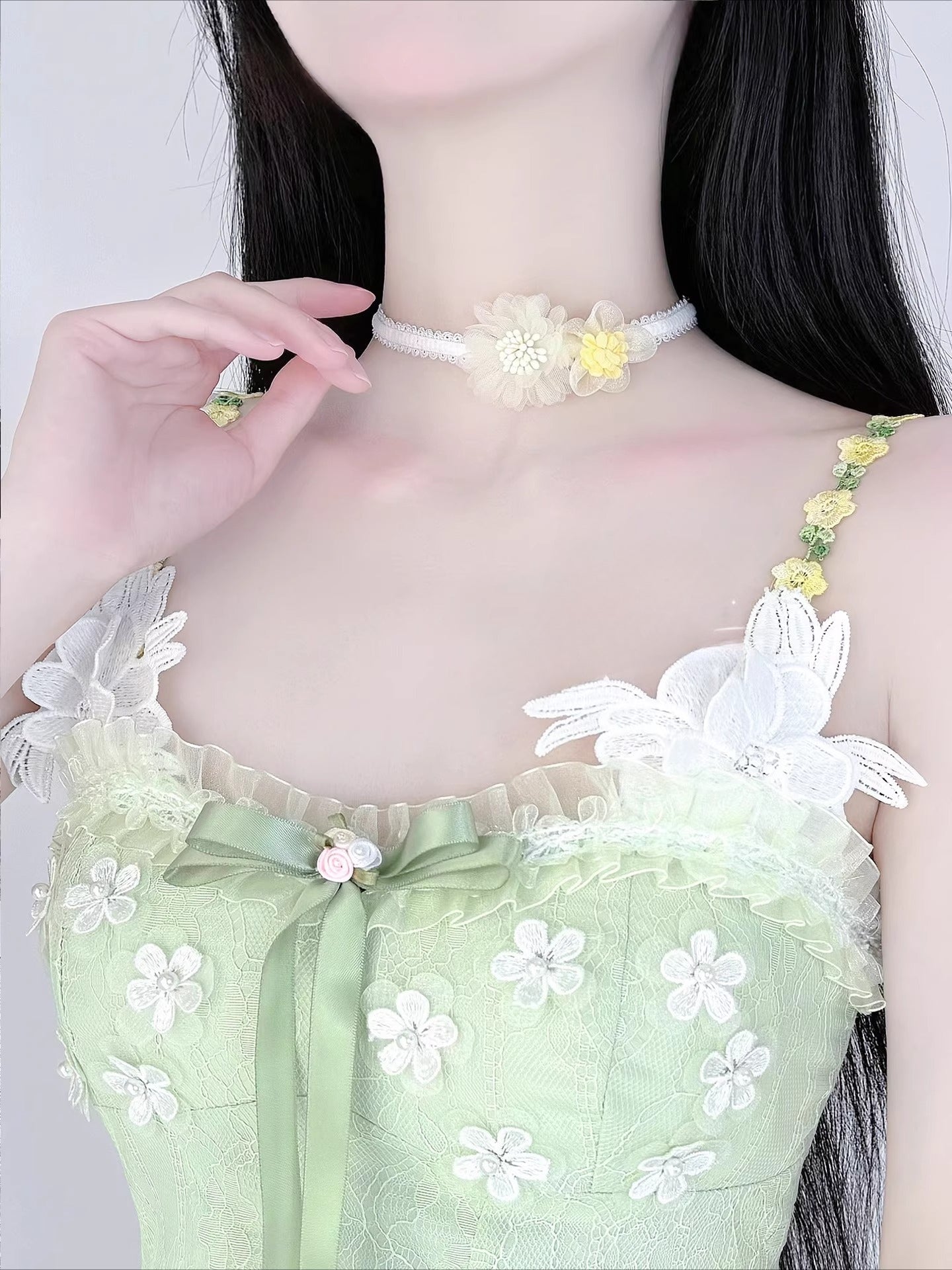 Inspired by the gentle romance of garden florals and Lolita aesthetics, this choker blooms with delicate charm. Featuring dainty pink daisies and a short, tailored fit, it rests perfectly on the collarbone for a touch of whimsical elegance. The playful yet refined design captures the essence of sweet Lolita fashion, making it an ideal accessory for adding a dreamy, feminine accent to any coordinate.