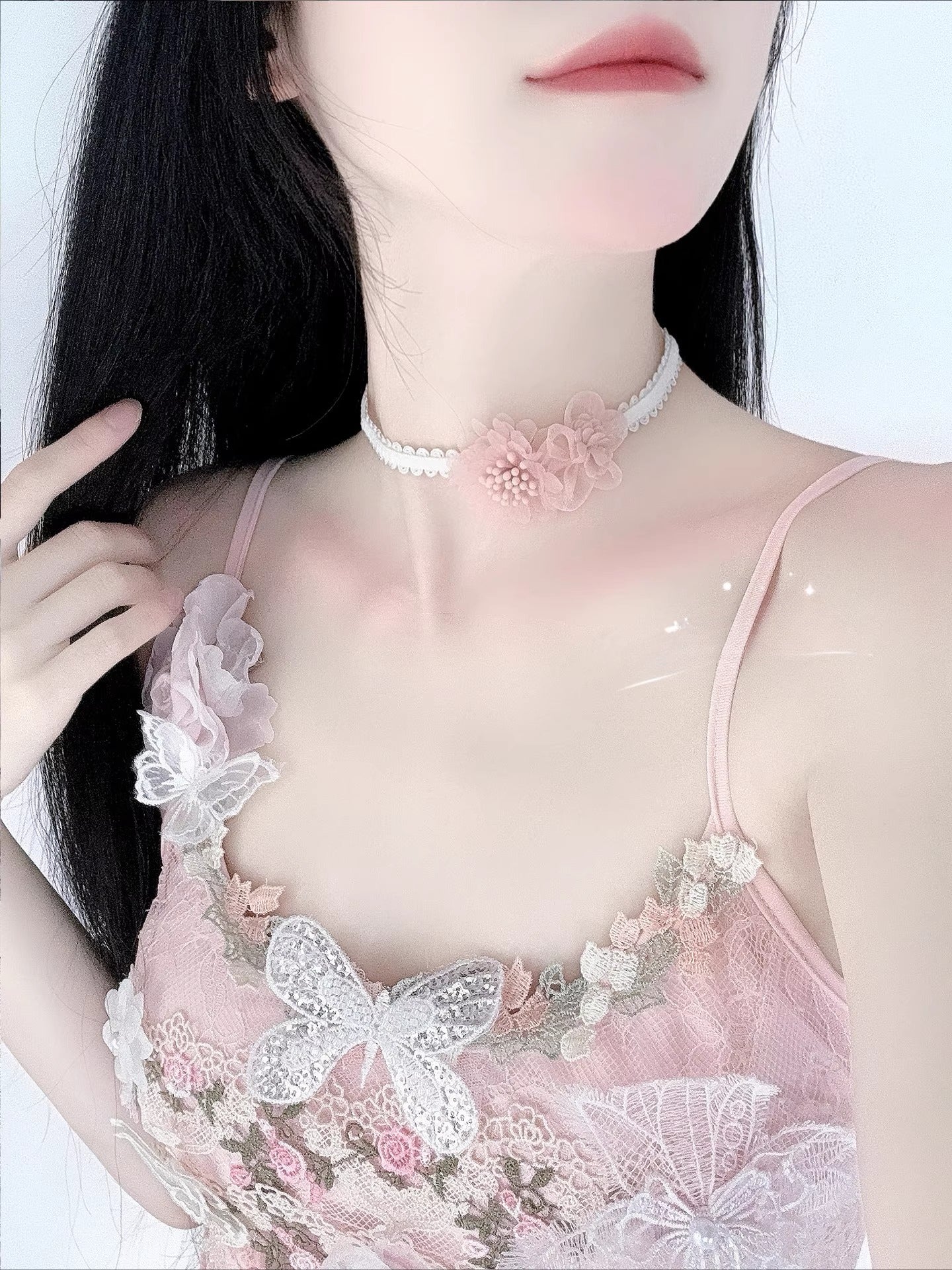 Inspired by the gentle romance of garden florals and Lolita aesthetics, this choker blooms with delicate charm. Featuring dainty pink daisies and a short, tailored fit, it rests perfectly on the collarbone for a touch of whimsical elegance. The playful yet refined design captures the essence of sweet Lolita fashion, making it an ideal accessory for adding a dreamy, feminine accent to any coordinate.