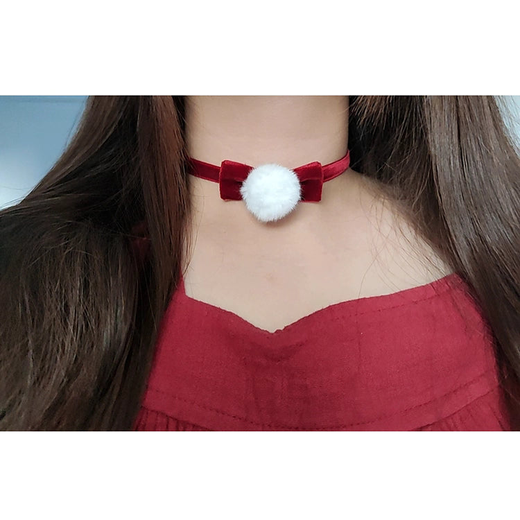 This Lolita Velvet Bowknot Choker Necklace is designed to bring festive elegance with a touch of sweetness. Crafted in rich wine red velvet, it features a delicate bowknot that highlights the neckline with charm and grace. Perfect for Christmas styling, maid-inspired looks, or classic Lolita outfits, this choker adds both warmth and sophistication. Lightweight and versatile, it makes an ideal accessory for holiday parties, tea gatherings, or themed photoshoots.