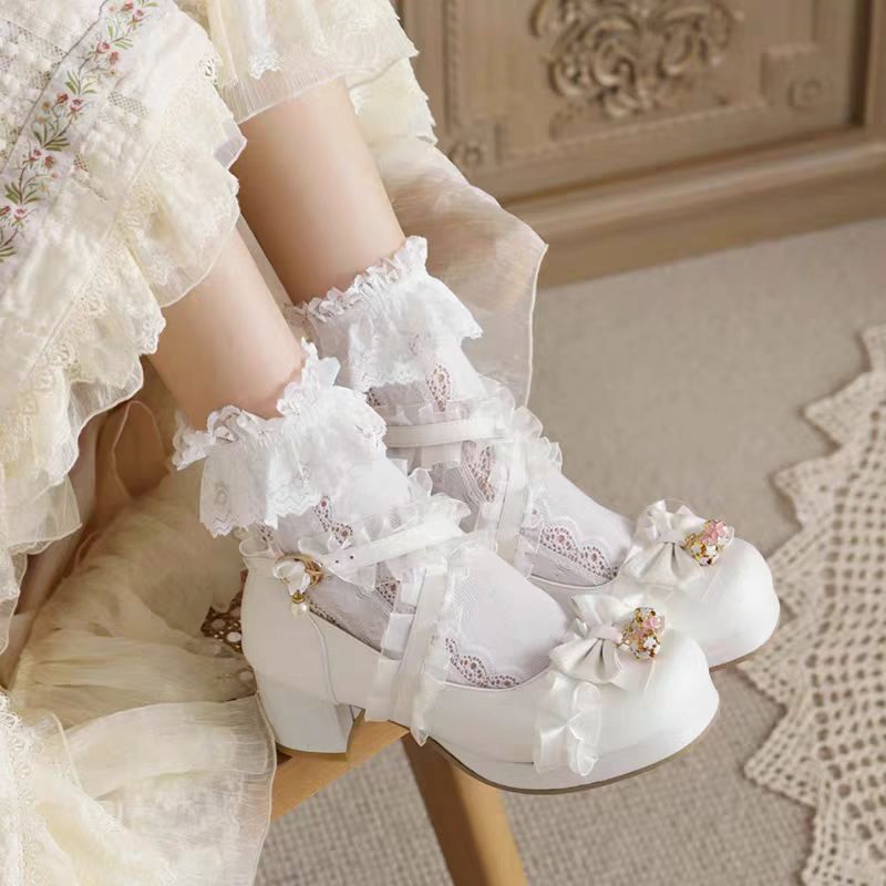 "Doll's Atelier" — Inspired by the delicate craftsmanship of vintage porcelain dolls and the whimsy of patisserie desserts, these heels blend JK school classic elements with Lolita fantasy. The chunky heel provides stability for playful steps, while lace and ribbon accents evoke a storybook charm.