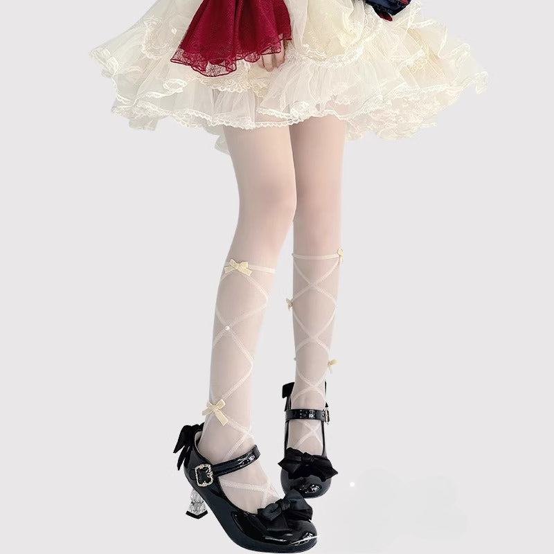 Inspired by the delicate elegance of Lolita fashion, these tights combine fantasy and function. Adorned with dainty pearl details and a charming bow accent, they embody romantic innocence. Crafted with lightweight, snag-resistant fabric for summer comfort, they offer both durability and dreamy aesthetics. Perfect for completing a sweet Lolita coordinate while ensuring graceful movement all day.