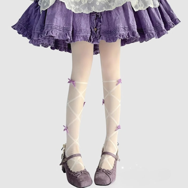 Inspired by the delicate elegance of Lolita fashion, these tights combine fantasy and function. Adorned with dainty pearl details and a charming bow accent, they embody romantic innocence. Crafted with lightweight, snag-resistant fabric for summer comfort, they offer both durability and dreamy aesthetics. Perfect for completing a sweet Lolita coordinate while ensuring graceful movement all day.